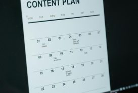 Close-up of digital content plan on laptop screen, ideal for scheduling visuals.